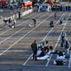 People arrive at a temporary homeless shelter with painted social-distancing boxes in a parking lot at Cashman Center on March 30, 2020 in Las Vegas, Nevada.